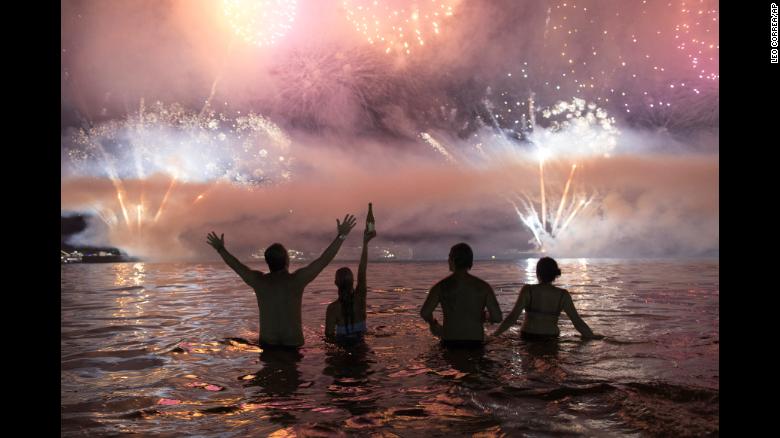 Fireworks explode over Copacabana beach in Rio de Janeiro on Monday, January 1, 2018.