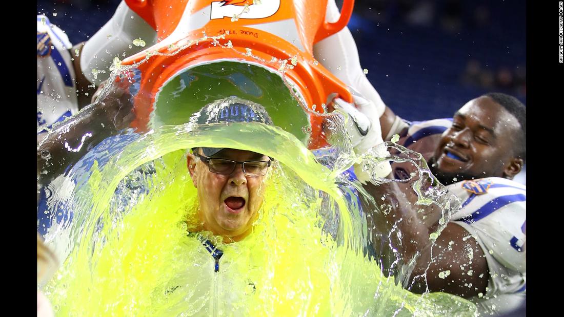 Duke head coach David Cutcliffe is doused with Gatorade after his team won the Quick Lane Bowl on Tuesday, December 26. The Blue Devils defeated Northern Illinois 36-14.