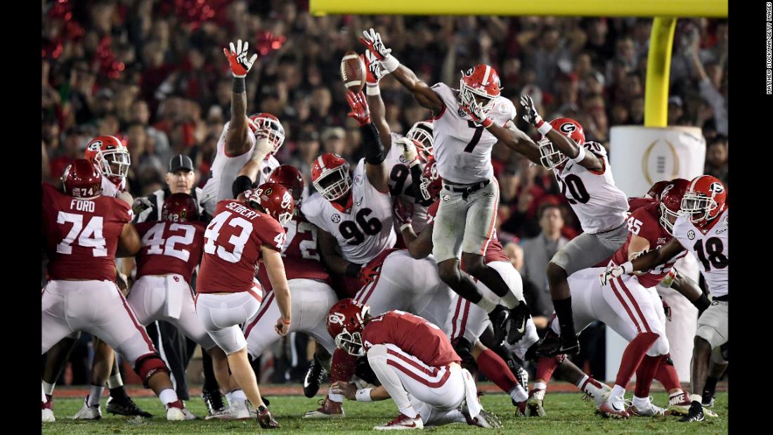 Georgia&#39;s Lorenzo Carter (No. 7) blocks an Oklahoma field-goal attempt in the second overtime of the Rose Bowl on Monday, January 1. Georgia scored on the next possession to win 54-48 and advance to the championship game of the College Football Playoff.