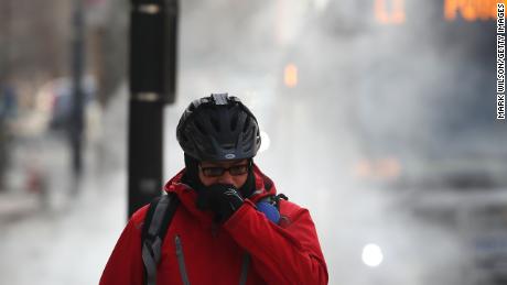 WASHINGTON, DC - JANUARY 03: A man is bundled up as he walks past a steam grate on January 3, 2018 in Washington, DC. A winter storm is traveling up the east coast overnight with significant accumulations of snow possible.   (Photo by Mark Wilson/Getty Images)