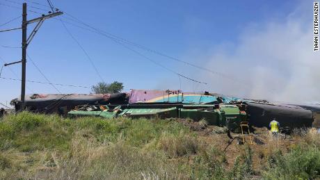 A picture taken by a passenger on the train involved in the crash Thursday shows carriages on their side.