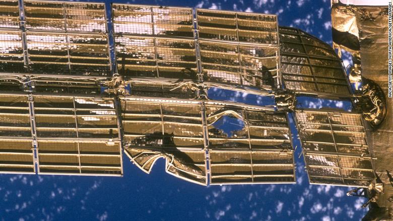 A close-up view of the solar array panel on Russia&#39;s Mir space station shows damage incurred by the impact in 1997 of a Russian unmanned resupply ship.