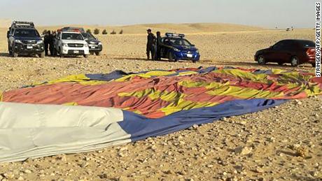 The remains of a hot air balloon appear Friday near the ancient Egyptian city of Luxor.