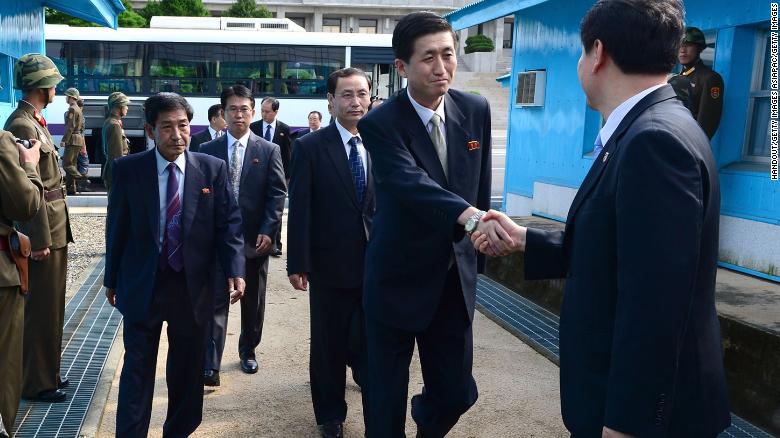 North Korean officials cross the military demarcation line (MLD) for a meeting with their South Korean counterparts on the demilitarized zone in 2013. 
