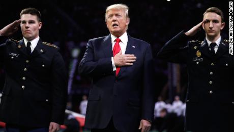 ATLANTA, GA - JANUARY 08:  U.S. President Donald Trump on field during the national anthem prior to the CFP National Championship presented by AT&amp;T between the Georgia Bulldogs and the Alabama Crimson Tide at Mercedes-Benz Stadium on January 8, 2018 in Atlanta, Georgia.  (Photo by Jamie Squire/Getty Images)