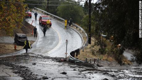 Mud flows over a road on Burbank, California. 