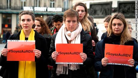 French feminist Caroline de Haas (center) has criticized Tuesday's letter in Le Monde. Here, she is shown protesting with others against violence against women in Paris last November. 