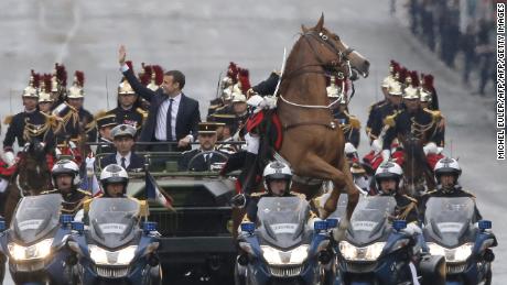 A horse rears during French President Emmanuel Macron&#39;s inauguration ceremony. Macron gifted his Chinese counterpart Xi Jinping a horse during his visit to China. 