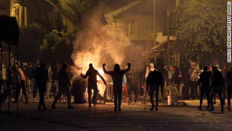 TOPSHOT - Tunisian protesters take to the streets in Siliana, some 130 kms south of Tunis, late on January 11, 2018. 
More than 200 people have been arrested and dozens of police hurt during clashes in Tunisia, the interior ministry said, as anger over austerity measures spilt over into unrest
 / AFP PHOTO / Faouzi DRIDI        (Photo credit should read FAOUZI DRIDI/AFP/Getty Images)