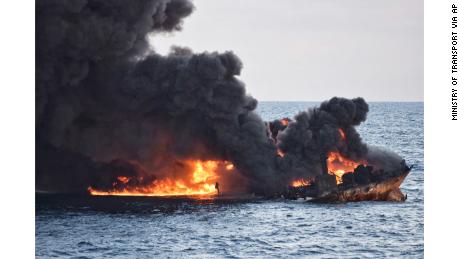 In this Sunday, Jan. 14, 2018 photo provided by China's Ministry of Transport, the burning Iranian oil tanker Sanchi is seen partially sunk in the East China Sea off the eastern coast of China. The fire from the sunken Iranian tanker ship in the East China Sea has burned out, a Chinese transport ministry spokesman said Monday, although concerns remain about possible major pollution to the sea bed and surrounding waters. (Ministry of Transport via AP)