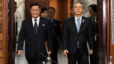 Moranbong member Hyon Song Wol seen with North and South Korean officials on January 15, 2018.