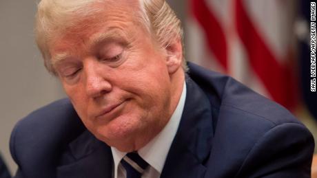 TOPSHOT - US President Donald Trump speaks during a meeting on prison reform in the Roosevelt Room of the White House in Washington, DC, January 11, 2018. / AFP PHOTO / SAUL LOEB        (Photo credit should read SAUL LOEB/AFP/Getty Images)