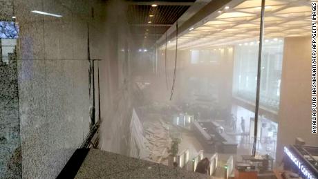Photo shows dust still clouding the lobby after an internal balcony collapsed at Indonesia&#39;s stock exchange in Jakarta on January 15, 2018.