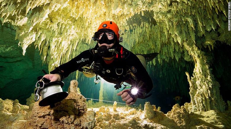 Divers from the Great Mayan Aquifer Project.