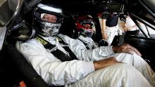 Freeman prepares to be driven during the Mercedes Benz-AMG Driving Experience prior to the Laureus World Sports Awards at the Circuit de Catalunya on May 21, 2006, in Barcelona, Spain.