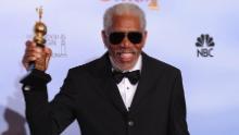 Freeman poses with the Cecil B. DeMille Award for lifetime achievement at the 69th annual Golden Globe Awards at the Beverly Hilton Hotel in Beverly Hills, California, on January 15, 2012.