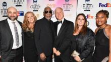 Freeman, the host and executive producer of the series "The Story of God with Morgan Freeman," poses with co-producer Reza Riazi (left), executive producer Lori McCreary, writer and executive producer James Younger, co-producer Kelly Mendelsohn and Alicia Marie Agramonte at the 49th NAACP Image Awards Non-Televised Awards Dinner in Pasadena, California, on January 14, 2018.