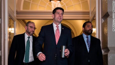 Speaker of the House Paul Ryan, R-Wis., arrives for a meeting of fellow Republicans on the first morning of a government shutdown after a divided Senate rejected a funding measure, at the Capitol in Washington, Saturday, Jan. 20, 2018. (AP Photo/J. Scott Applewhite)
