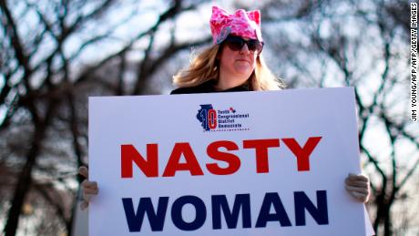 A woman holds a sign that reads &quot;Nasty Woman&quot; -- a reference to what Donald Trump said about his opponent, Hillary Clinton, during a presidential debate -- during a demonstration in Chicago.