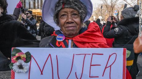 A woman holds a sign that says &quot;mujer&quot; -- the Spanish word for &quot;woman&quot; -- during a demonstration in New York.