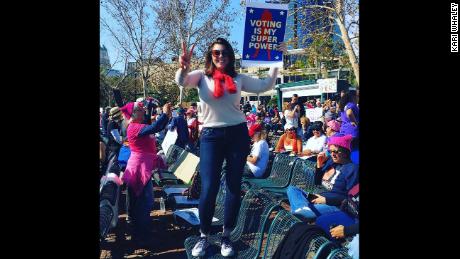 Kari Whaley holds a sign during a march in Orlando, Florida on January 21, 2018.