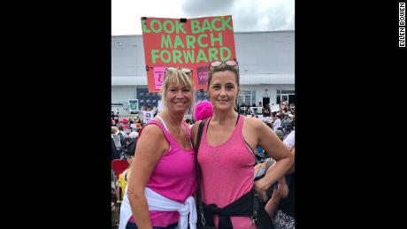 Ellen Bowen, left, took a photo with her friend at the march in Miami.