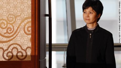 Former North Korean spy Kim Hyon Hui arrives for a press conference with Shigeo Iizuka and Koichiro Iizuka, family members of Yaeko Taguchi, on March 11, 2009. 