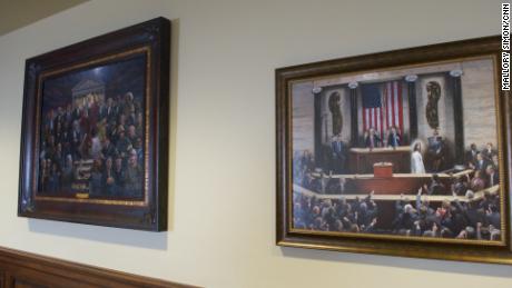 Landry has paintings of Moses and Jesus in his direct eyeline.