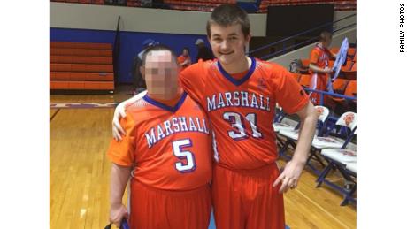 Daniel Austin, right, was wounded during the mass shooting at Marshall County High School.