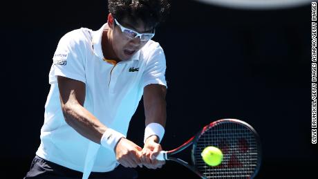Hyeon Chung strikes a backhand. 
