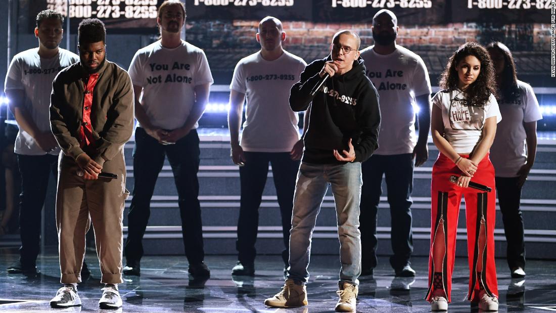 From left, Khalid, Logic and Alessia Cara perform &quot;1-800-273-8255.&quot; The song title is the phone number of the National Suicide Prevention Lifeline. 