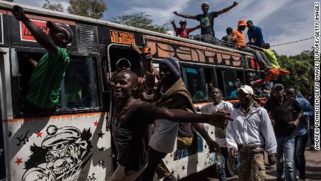 Jubilant opposition supporters demonstrate prior to a mock "swearing-in" ceremony of presidential candidate Raila Odinga on January 30.