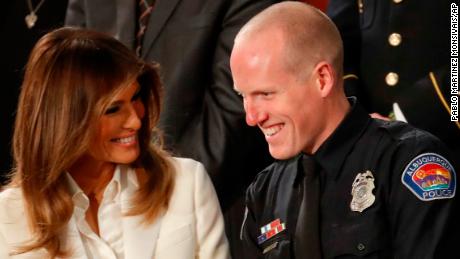 First lady Melania Trump talks with Albuquerque Police Officer Ryan Holets and this wife before the State of the Union address to a joint session of Congress on Capitol Hill in Washington, Tuesday, Jan. 30, 2018. (AP Photo/Pablo Martinez Monsivais)