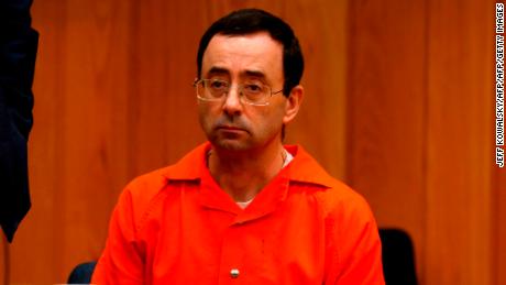 Former Michigan State University and USA Gymnastics doctor Larry Nassar listens during the sentencing phase in Eaton, County Circuit Court on January 31, 2018 in Charlotte, Michigan. Last week Nassar was sentenced in Ingham County to 40 years to 175 years in prison.
The number of identified sexual abuse victims of former USA Gymnastics doctor Larry Nassar has grown to 265, a Michigan judge announced Wednesday as a final sentencing hearing commenced. Prosecutors said at least 65 victims were to confront Nassar in court, in the last of three sentencing hearings for the disgraced doctor who molested young girls and women for two decades in the guise of medical treatment.
 / AFP PHOTO / JEFF KOWALSKY        (Photo credit should read JEFF KOWALSKY/AFP/Getty Images)