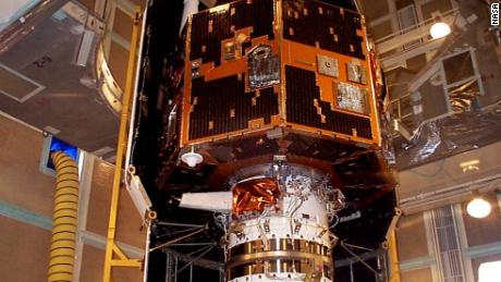 The IMAGE spacecraft is seen undergoing launch preparations in early 2000.