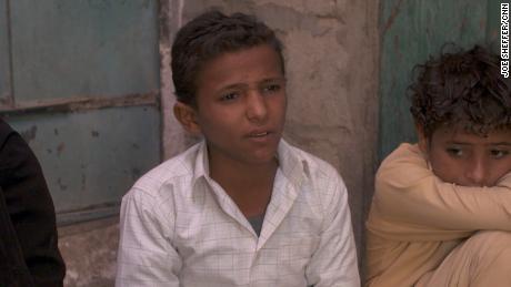 Younis, 13, says he learned to use a machine gun as a young chid. 