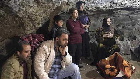 Turkish bombs drive families into caves