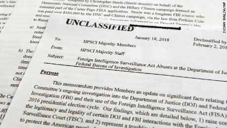A intelligence memo is photographed in Washington, Friday, Feb. 2, 2018. After President Donald Trump declassified the memo, the Republican-led House Intelligence Committee released the memo based on classified information that alleges the FBI abused U.S. government surveillance powers in its investigation into Russian election interference.(AP Photo/Susan Walsh)