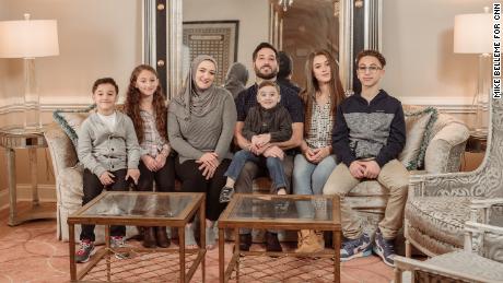 Hanadi Asad, here with her husband, Jamaal, and their five children, is trying to grow her dessert and event business at a time that feels uncertain. 