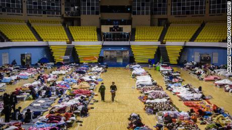 Residents take shelter in a local stadium after an earthquake and aftershocks on February 7.