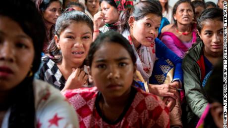 Nepalese Christians react to graphic pictures of aborted fetuses during a lecture by Soman Rai.