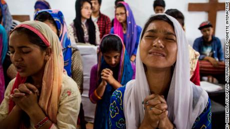 Nepalese Christians pray during a weekly church service in a small village of Tikhatal, in the Dolakha region of Nepal.