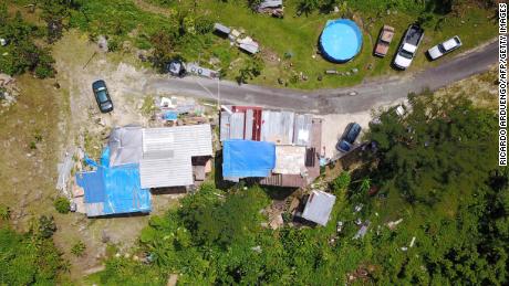 Six months after Hurricane Maria hit Puerto Rico, many homes in Corozal still need roofs and repairs.