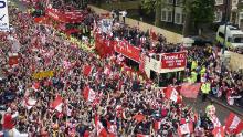 Open top bus parades began the norm for Arsenal fans, this one taking place in 2002.