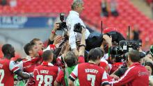 Then finally, after a nine-year drought, Arsenal won silverware once again after beating Hull City in a gripping 2014 FA Cup final. Arsenal players carried their French manager as they celebrated after the match.