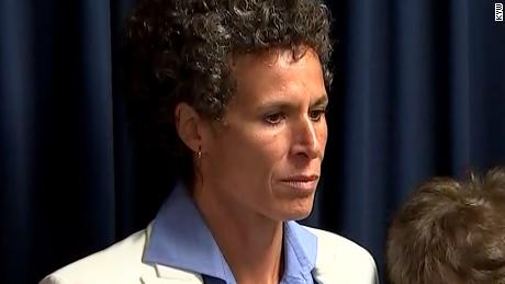 Andrea Constand stands at a press conference after Bill Cosby was found guilty on April 26, 2018.