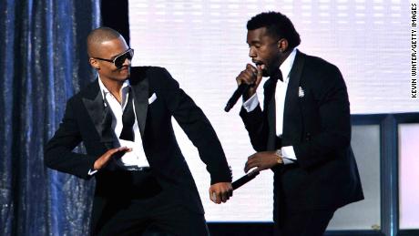 Rappers T.I. (L) and Kanye West perform at the 51st Grammy Awards in 2009. 