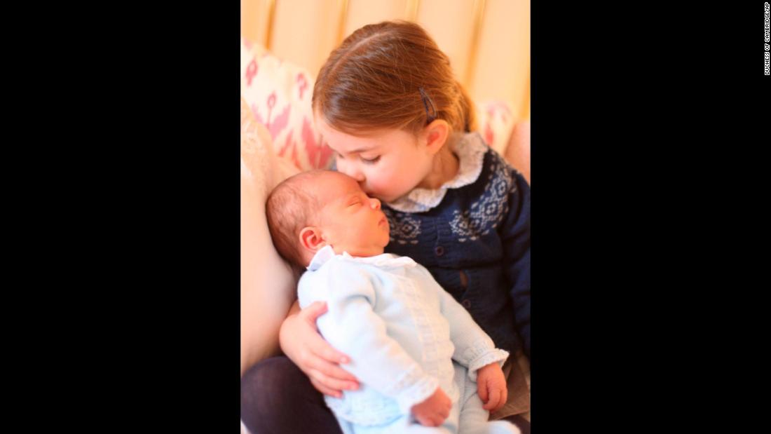 Britain&#39;s Princess Charlotte, the 2-year-old daughter of Prince William and Duchess Catherine, kisses her new baby brother, Prince Louis, in this photo &lt;a href=&quot;https://www.cnn.com/2018/05/05/europe/prince-louis-princess-charlotte-photos-intl/index.html&quot; target=&quot;_blank&quot;&gt;released by Kensington Palace&lt;/a&gt; on Sunday, May 6.