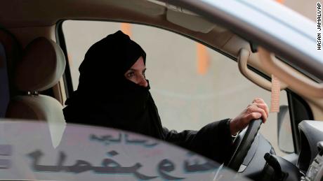  Aziza al-Yousef drives a car on a highway in Riyadh, Saudi Arabia, as part of a campaign to defy Saudi Arabia&#39;s ban on women driving.