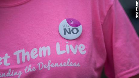 Faulkner wears an Irish &#39;Vote NO&#39; badge on her Let Them Live shirt. Faulkner says the group&#39;s shirts were designed in pink to &quot;reappropriate the color pink back from Planned Parenthood.&quot;

